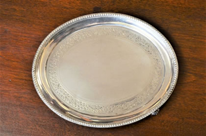 Silver tea-pot stand 