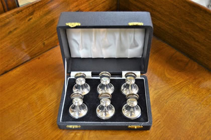 Set of six silver menu holders