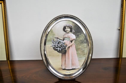 Large silver oval photo frame