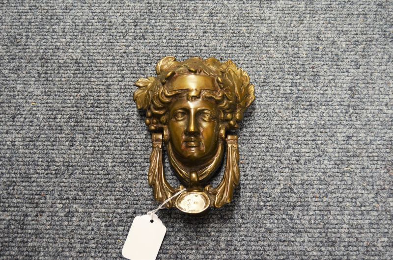 Antique bronze door knocker