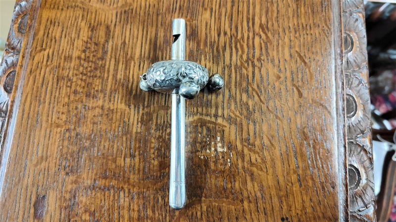 Silver chinese bays  rattle & whistle