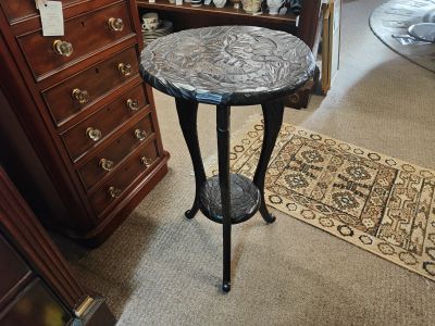 Carved wooden plant stand