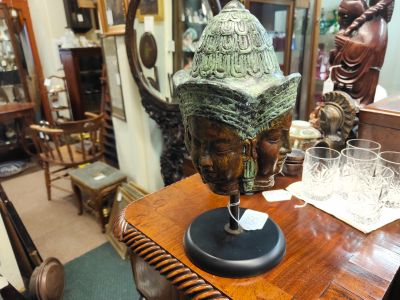 Bronze asian heads sculpture