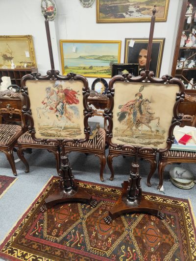 Pair of victorian rosewood pole screens 