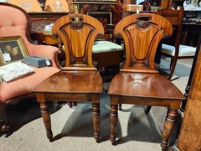 Pair of mahogany hall chairs