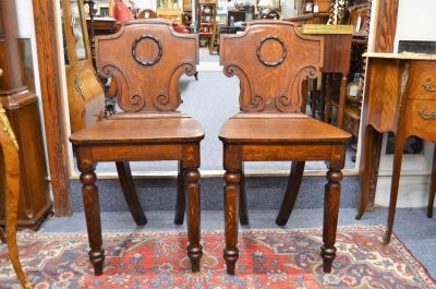 Pair of oak hall chairs 