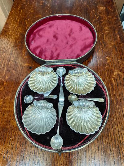 Set of four cased shell salts & spoons 