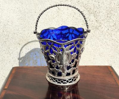 George III pierced silver sugar basket & liner