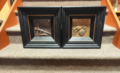 Pair of framed bronze plaques  , signed