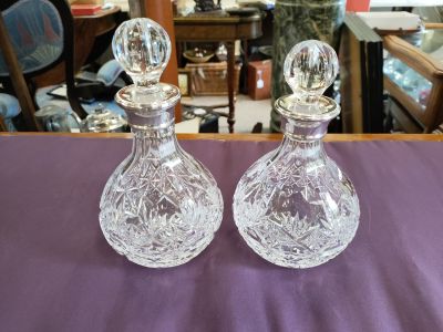 Pair of silver mounted glass decanters