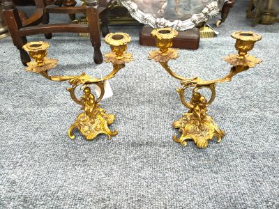 Pair of antique gilded cherub candelabra  of antique gilded cherub candleabra