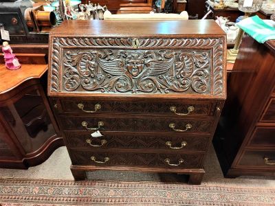 19th century carved oak bureau with gilt metal handles