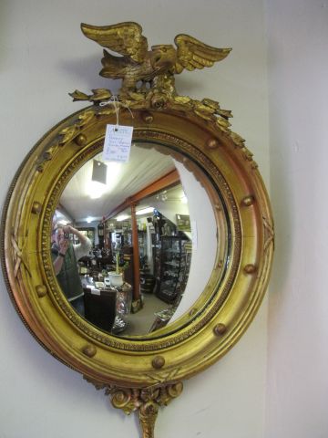 A regency gilt framed convex mirror