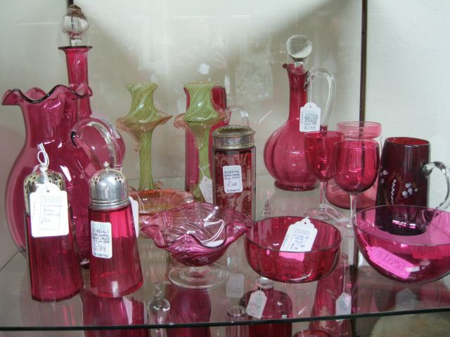 A large selection of victorian ruby and vaseline glass
