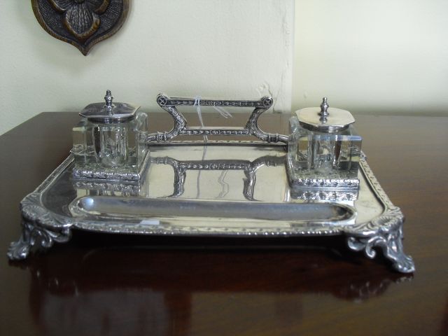 A plated ink stand.