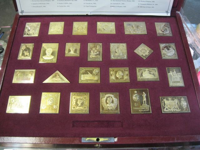 Cased  Silver Gilt Stamps