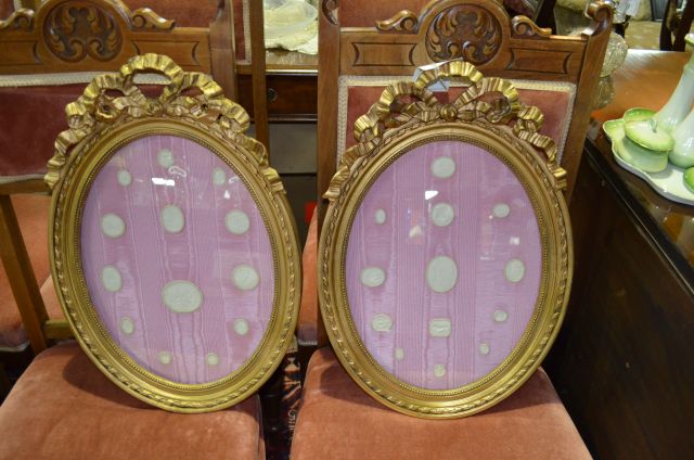 Pair of 19th century gilt framed plaster plaques
