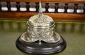 Victorian silver inkwell mounted on wooden plinth Thumbnail 1