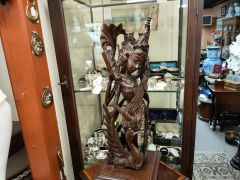 Carved wooden figure Thumbnail 4