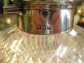 A silver topped perfume bottle Thumbnail 3