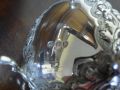 A silver sauce boat. Thumbnail 4